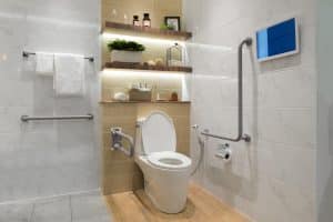 Bathroom safety grab bars fitted beside a toilet