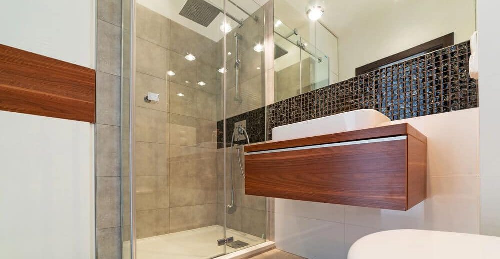 Glass shower after a tub-to-shower conversion